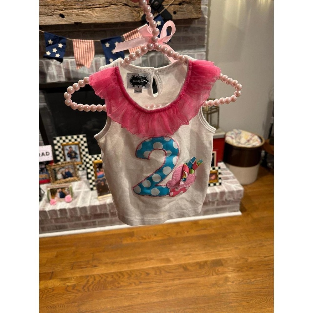 Pie white birthday top features a ruffled pink collar and a large "2" applique